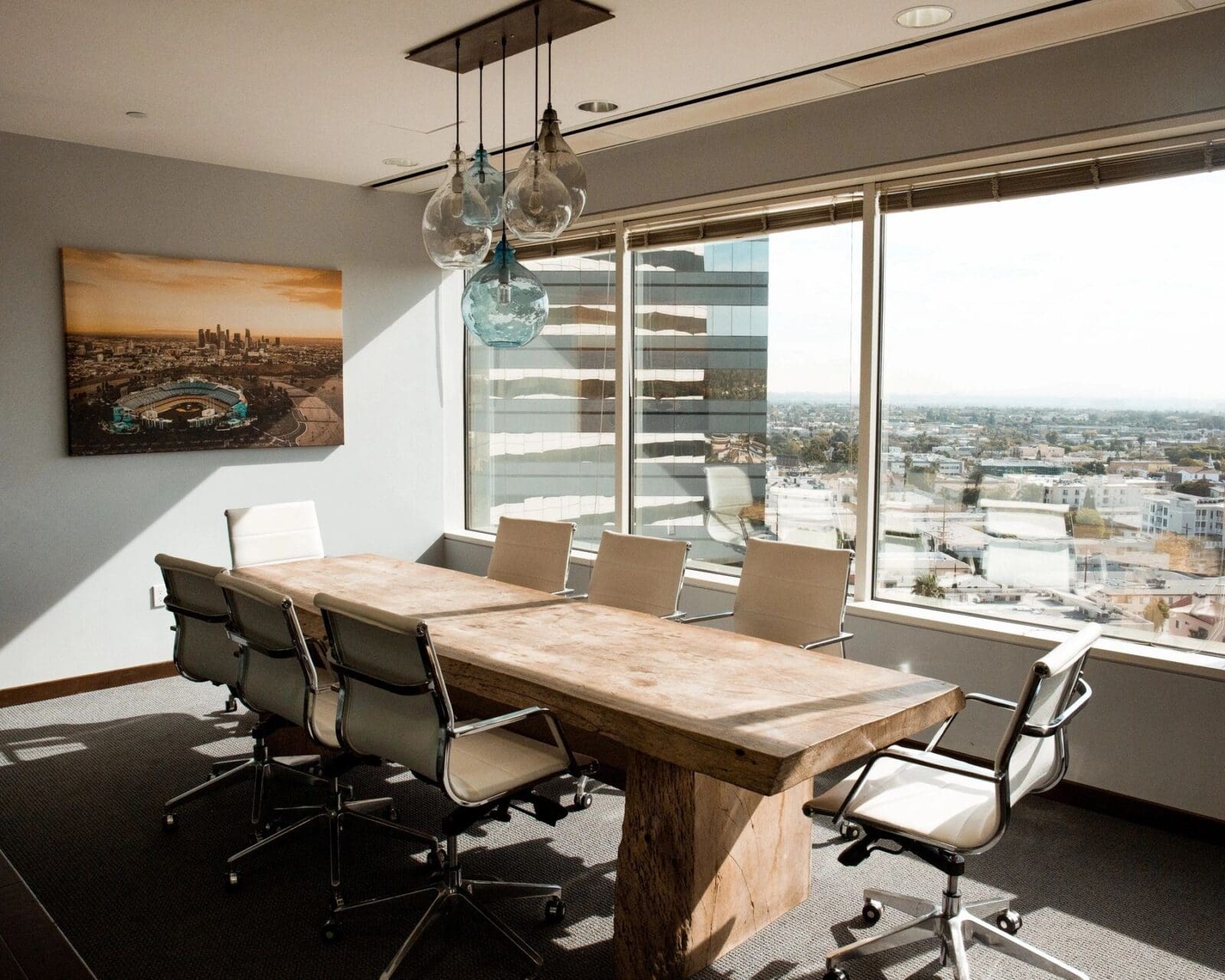 Modern office conference room with city view.